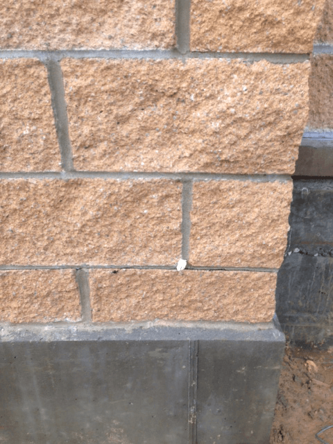 Excess admixture in mortar - spilt face block